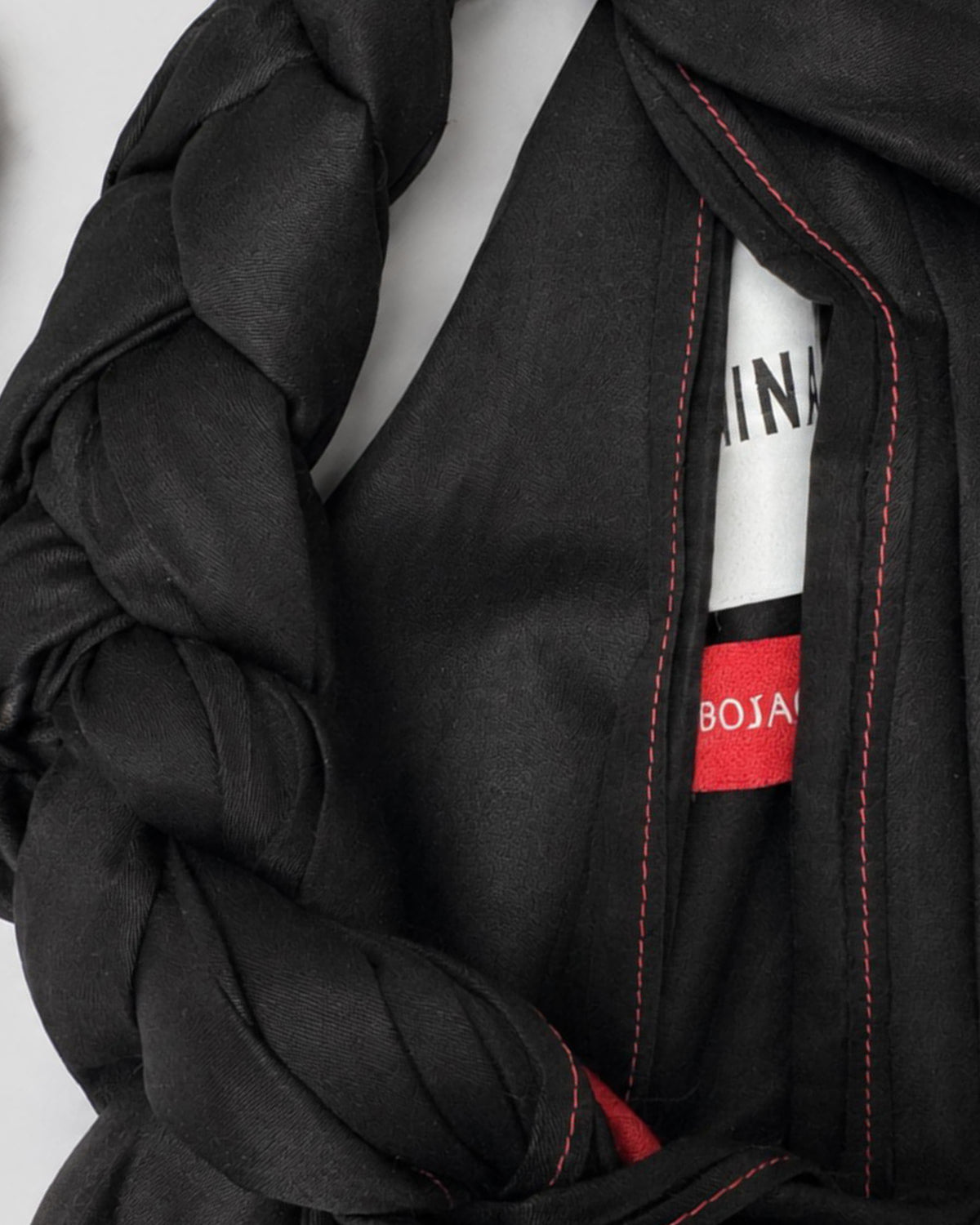 Bojagi Bag Mini in black, knotted construction and label detail