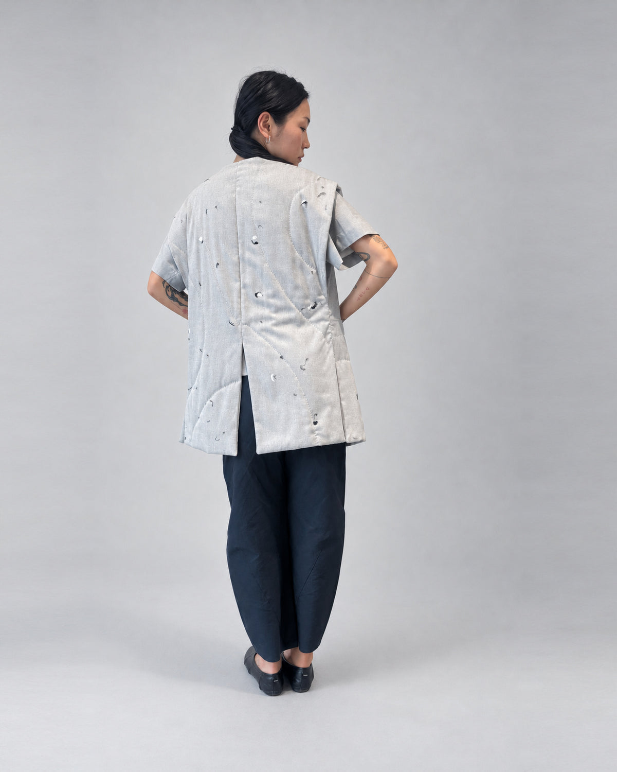 Anujin wearing Frequency Nubi Coat — back.