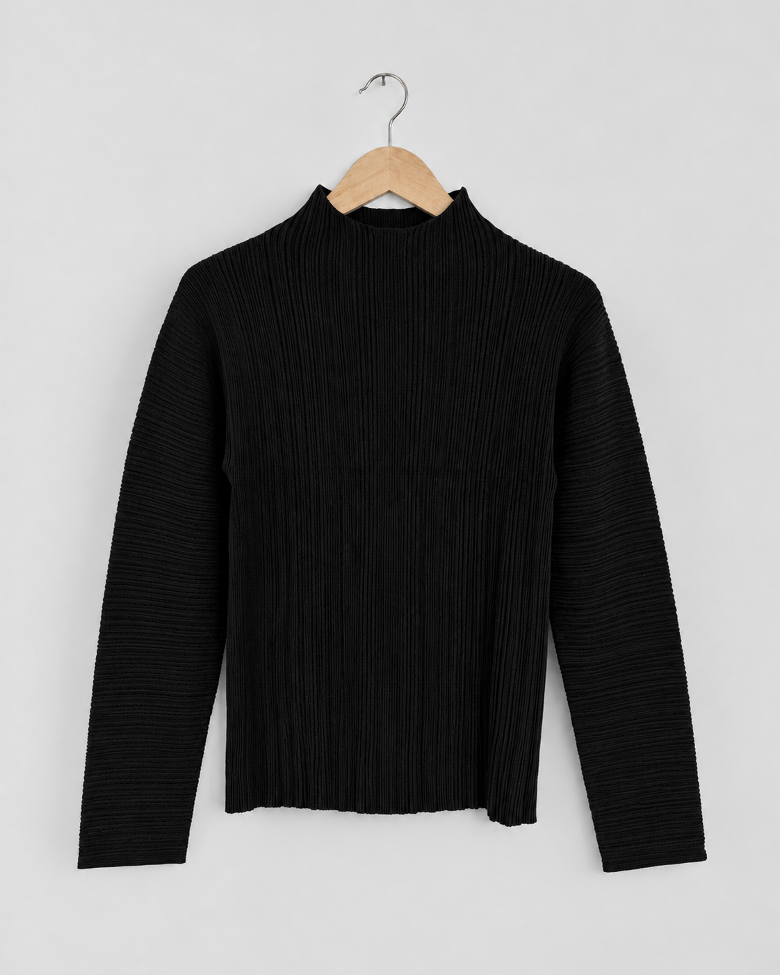 NINA YUUN Wool-Cotton Pleated Pullover in black — full front view showing the high neckline, vertical body pleats and horizontal sleeve pleats.